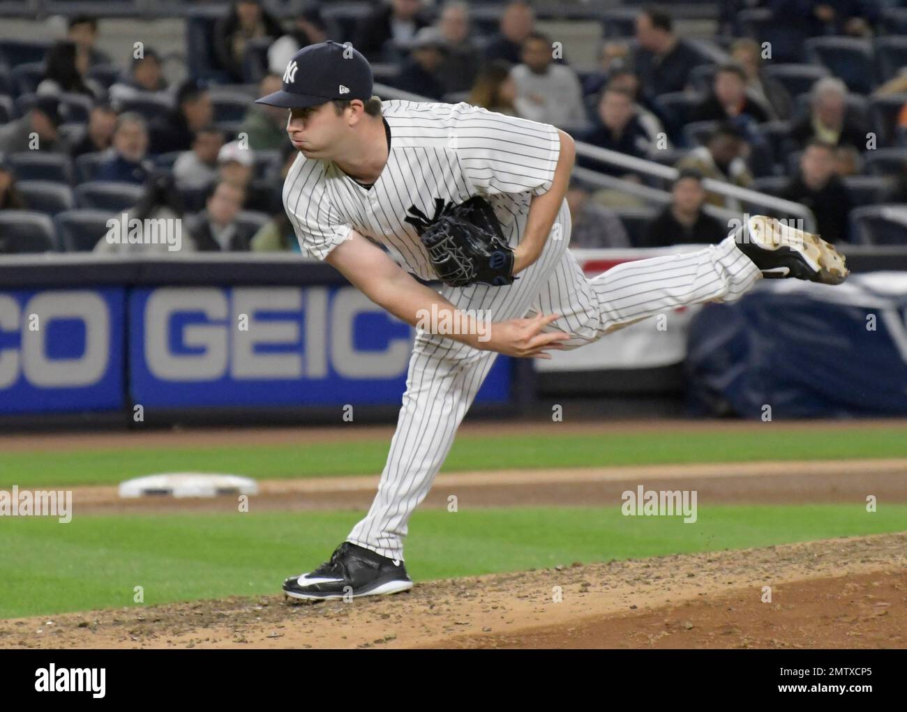 New York Yankees relief pitcher Adam Warren delivers the ball to the ...