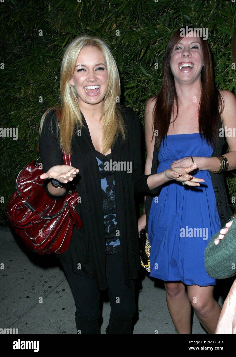 Exclusive!! Actress Tiffany Thornton poses for photos with friends outside the restaurant Koi in Los Angeles, CA. 1/17/09. Stock Photo