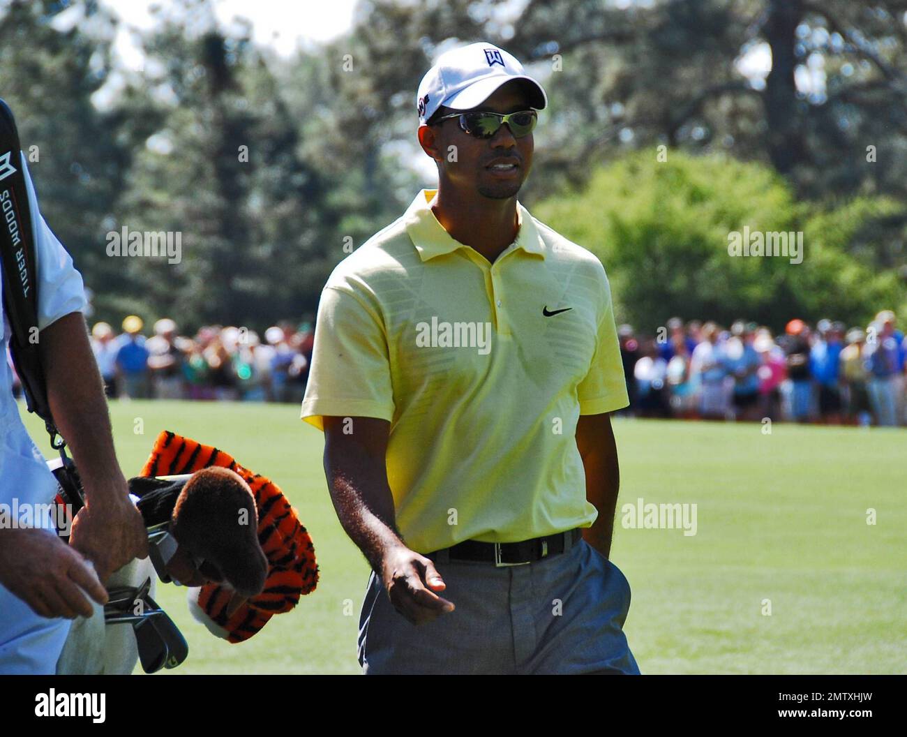 Tiger Woods on the golf course taking time for a practice run during the 2010 Masters Golf Tournament.  This marks Tiger's first time playing golf publicly since news broke about his extramarital affairs in November 2009. Augusta, GA. 04/06/10.   . Stock Photo