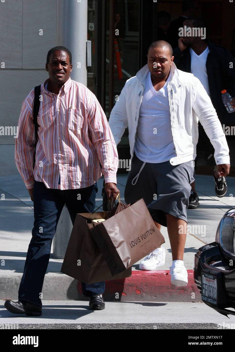 Rapper and producer Timbaland leaves the Louis Vuitton store after