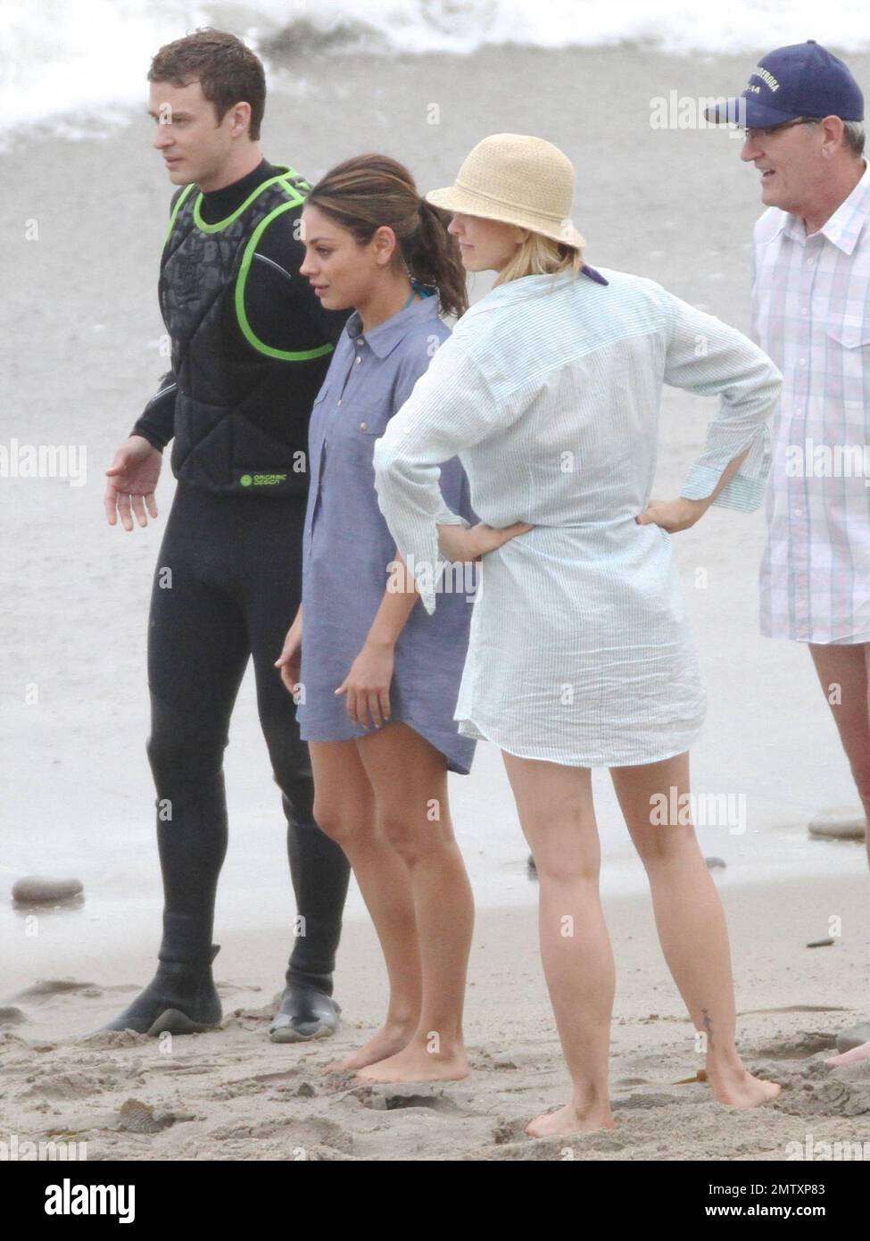 Justin Timberlake appears to get a bit paternal while on the set of 'Friends with Benefits' shooting on location at a Malibu beach.  In between takes Justin seemed to connect with young actor Nolan Gould.  Also on set was Mila Kunis, Jenna Elfman and a midget who was Gould's stand-in. Los Angeles, CA. 09/07/10. Stock Photo