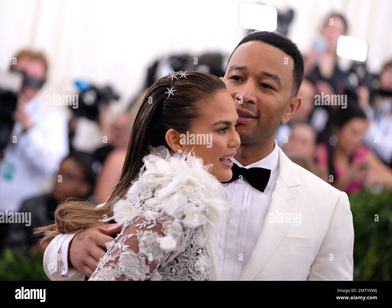 Chrissy Teigen, left, and John Legend attend The Metropolitan Museum of