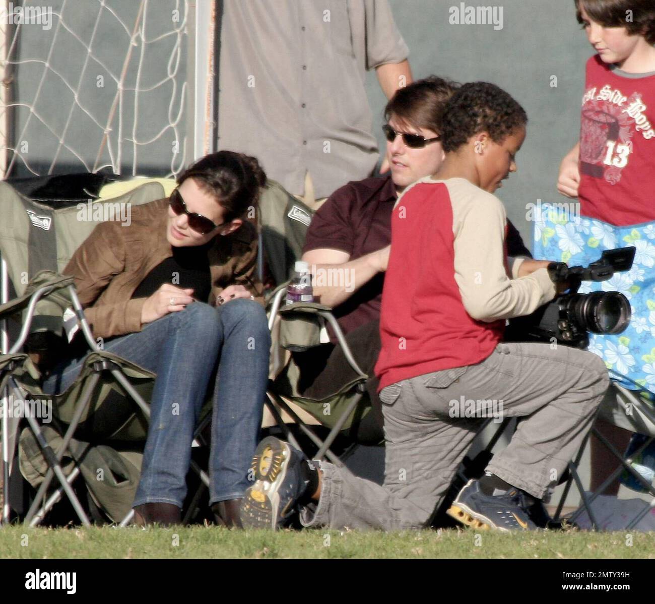 Tom and Katie spend a day at the ball park with Tom's adopted children