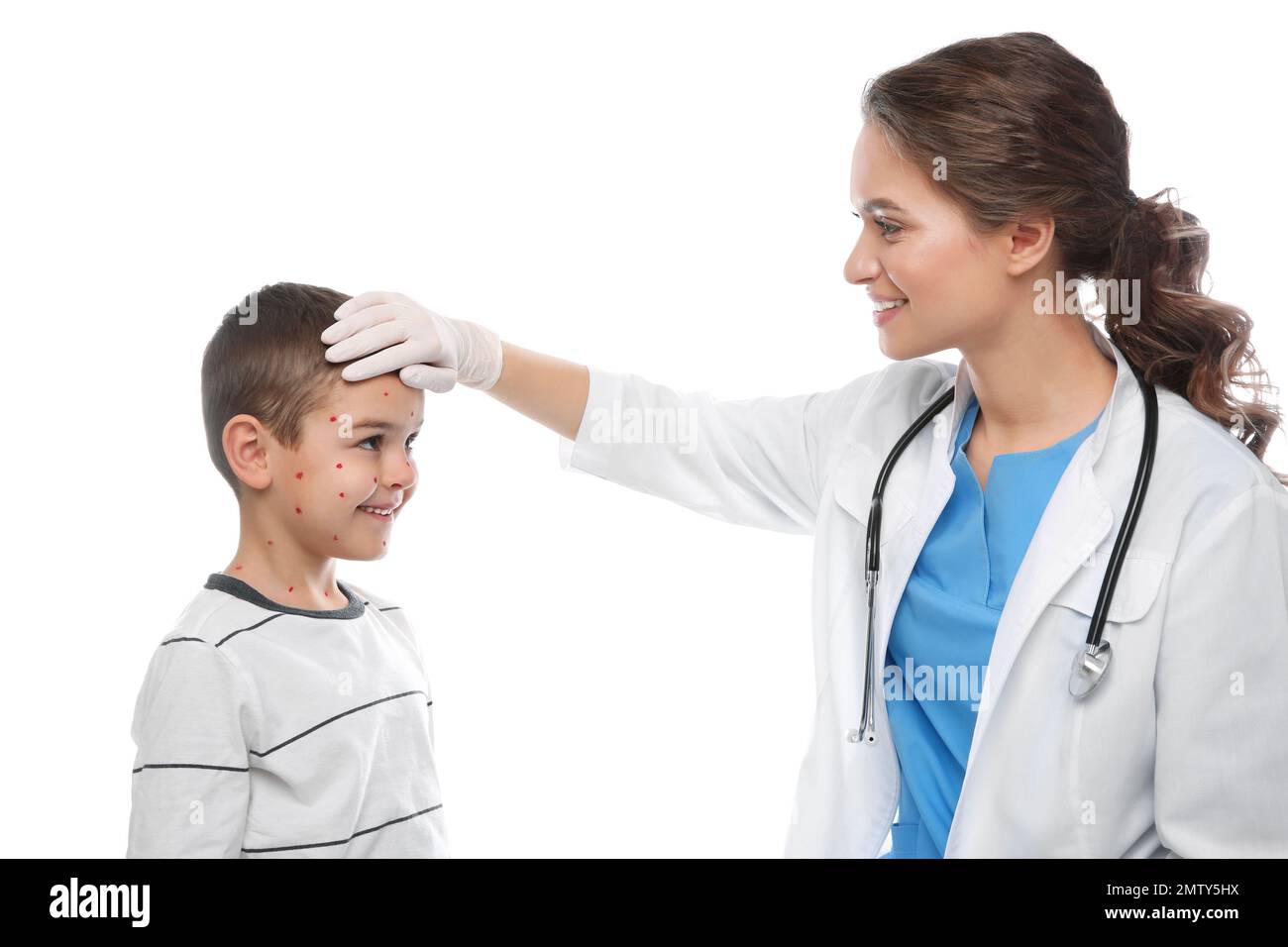 Chickenpox Doctor Doctor examining little boy with chickenpox on white background ...