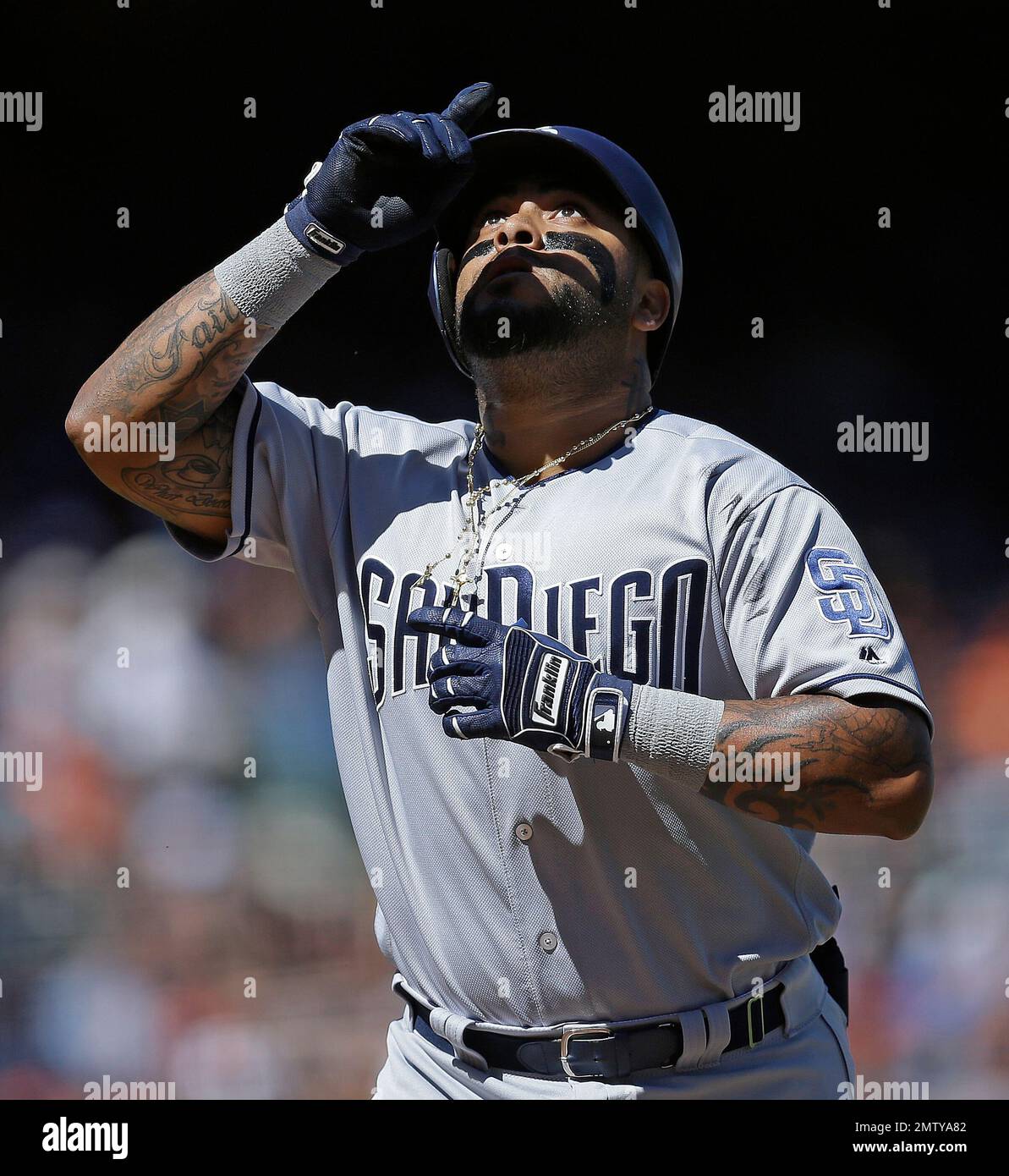 San Diego Padres' Hector Sanchez celebrates after hitting a two-run home  run off San Francisco Giants' Mark Melancon in the ninth inning of a  baseball game Sunday, April 30, 2017, in San