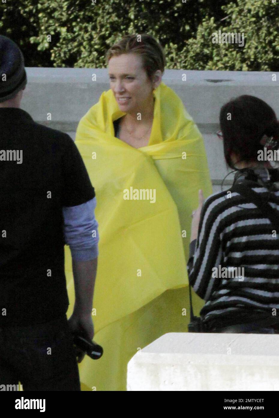 EXCLUSIVE!! Toni Collette covers up with a yellow tarp as she has some work  done on her hair while on location shooting an episode of "The United  States of Tara" in Pasadena,