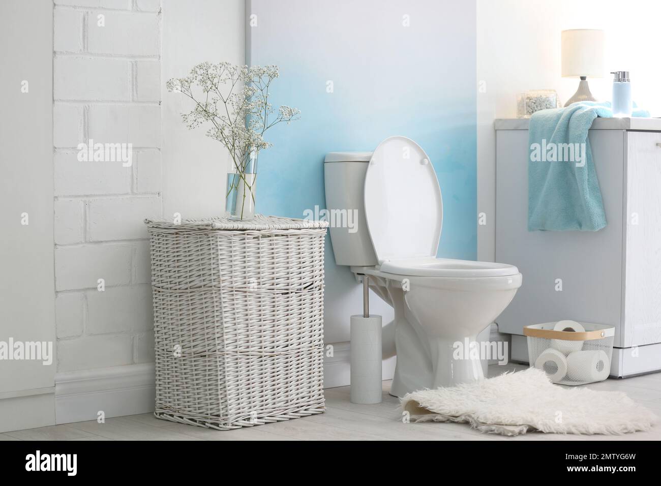 Modern toilet bowl in stylish bathroom interior Stock Photo - Alamy