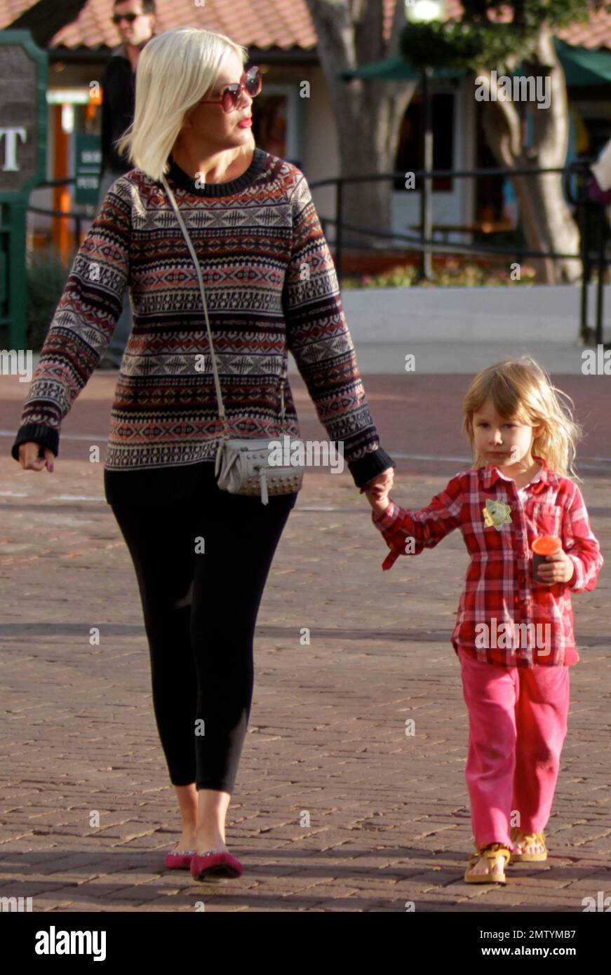 Actress Tori Spelling with her family at Malibu Country Mart in Malibu
