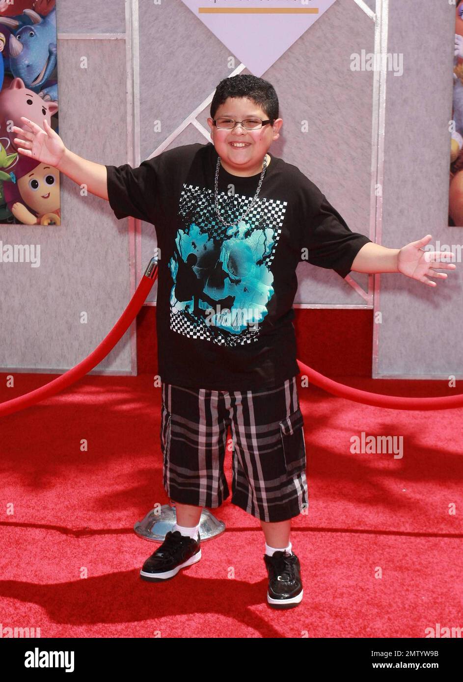 Rico Rodriguez walks the red carpet at the premiere of "Toy Story 3 ...