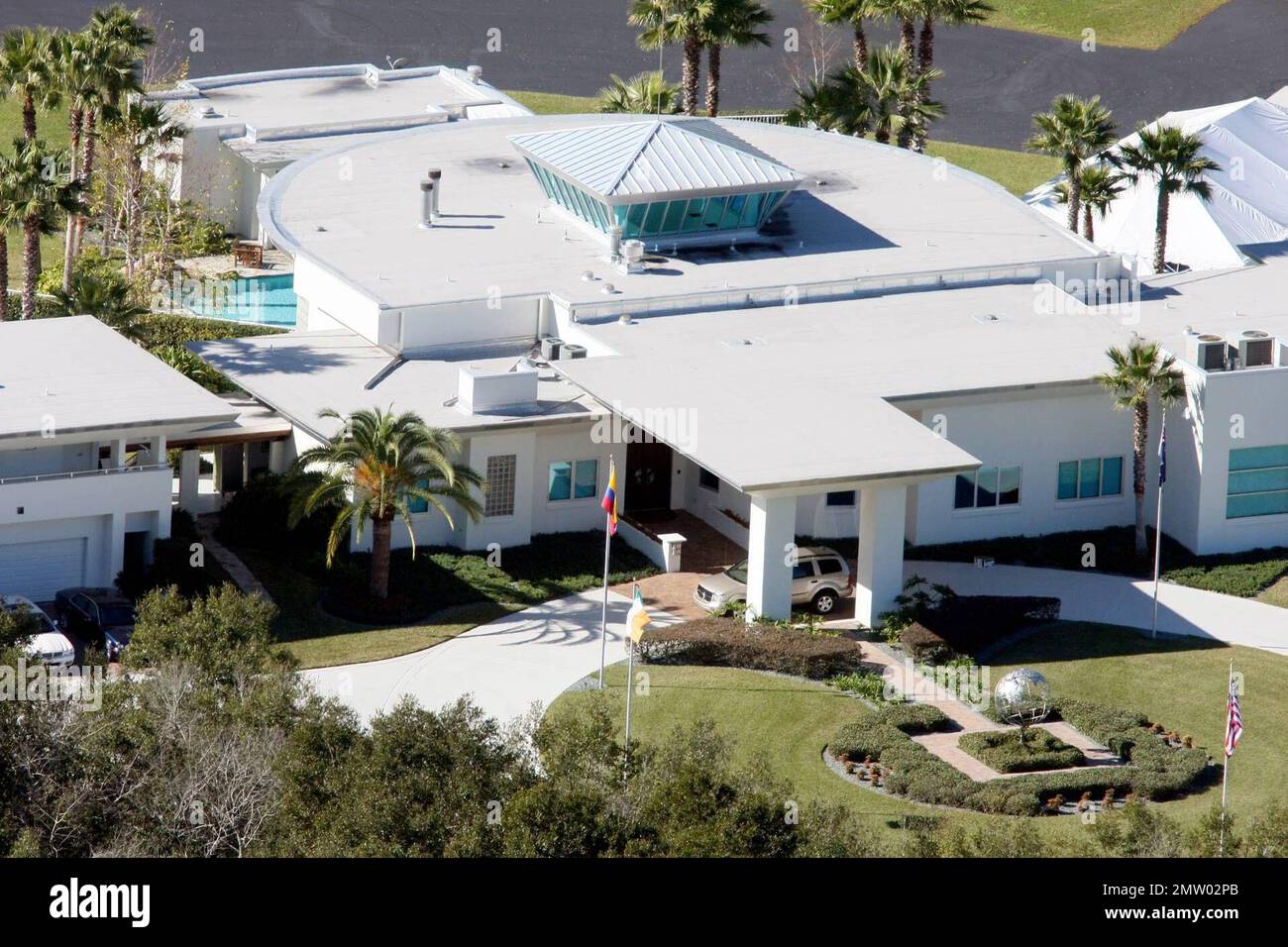 John Travolta and Kelly Preston's home in Ocala, Florida has been set up  with a large tent in the back yard to accomodate friends and family who  will attend a ceremony for