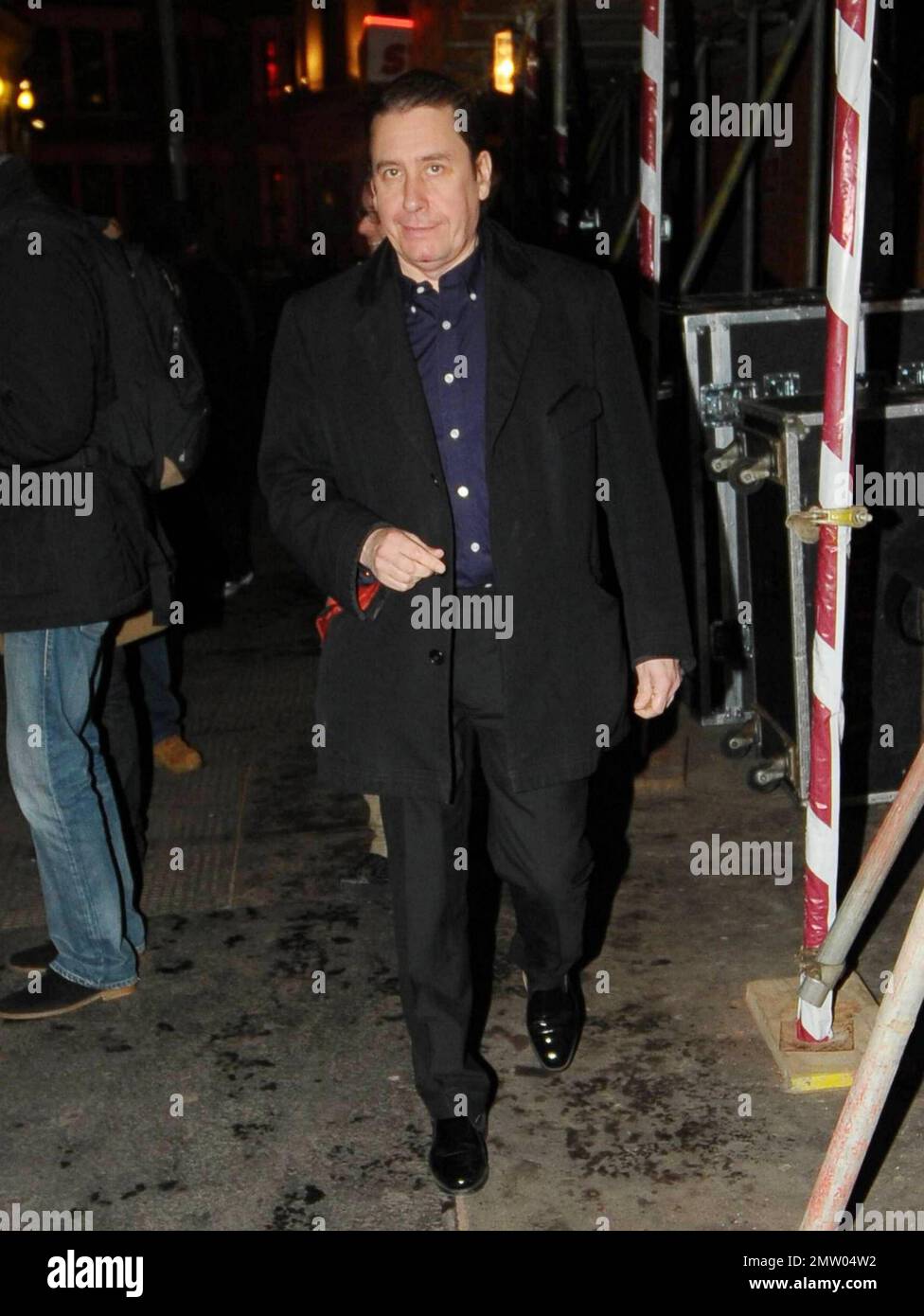 Pianist Jools Holland arrives at the West End's Ambassadors Theatre for an intimate one-night only concert launching the tribute album Boogie 4 Stu.  The album was created by Ben Waters in memory of the late Ian Stewart (aka Stu), co-founder of The Rolling Stones, who died from a heart attack at the age of 47 in 1985.  Proceeds from the album will go to the British Heart Foundation. London, UK. 03/09/11. Stock Photo