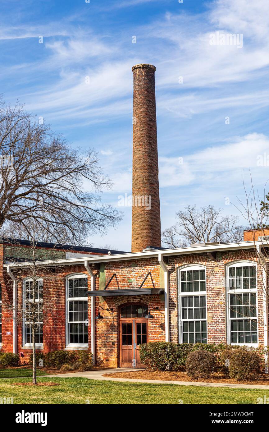 WAXHAW, NC, USA28 JAN 2023 Brick smokestack behind one story