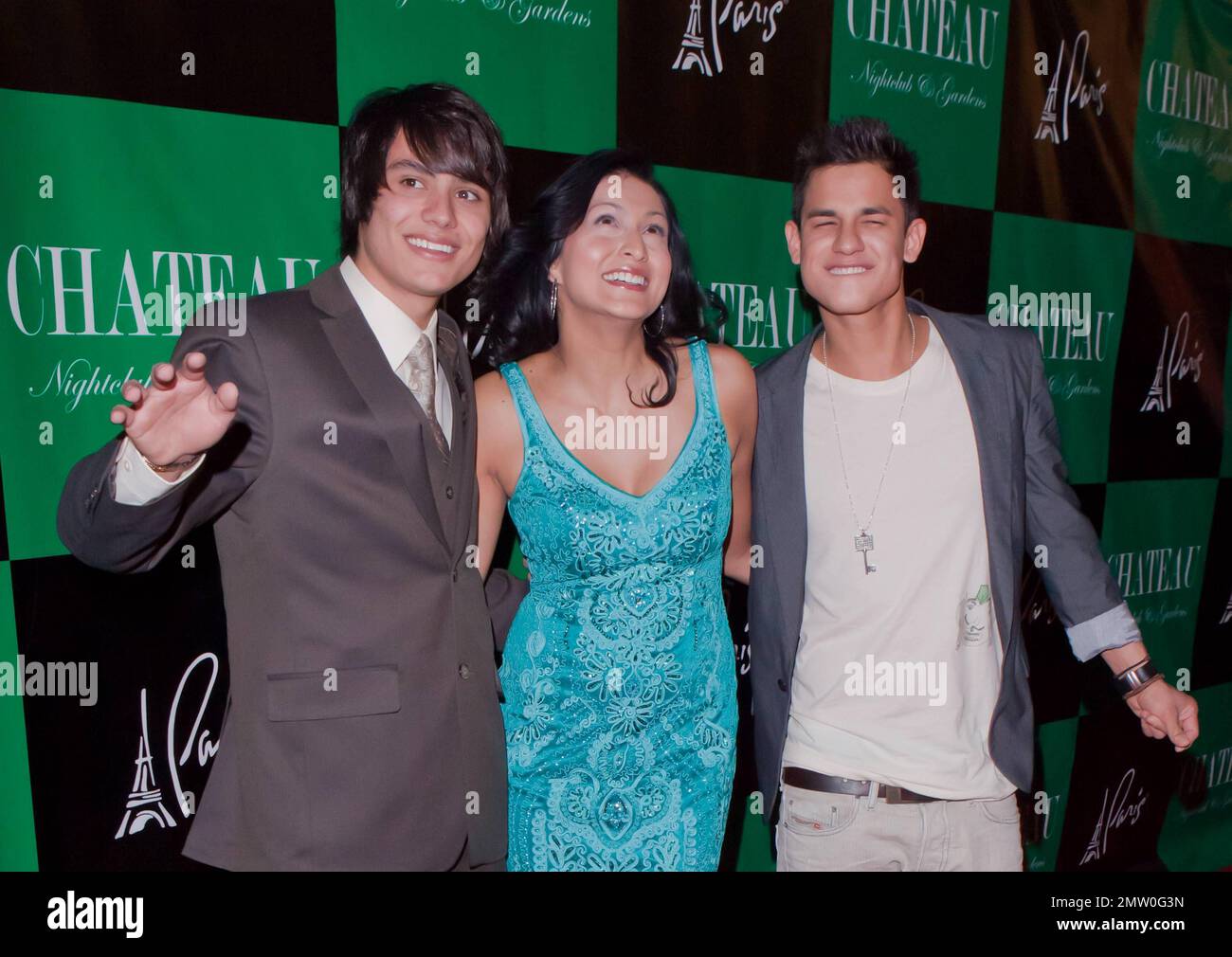 'Twilight' stars Bronson Pelletier, Tinsel Korey and Kiowa Gordon pose for photographers at Chateau Nightclub inside the Paris Hotel to celebrate Korey and Gordon's birthdays. Las Vegas, NV. 03/26/11. Stock Photo