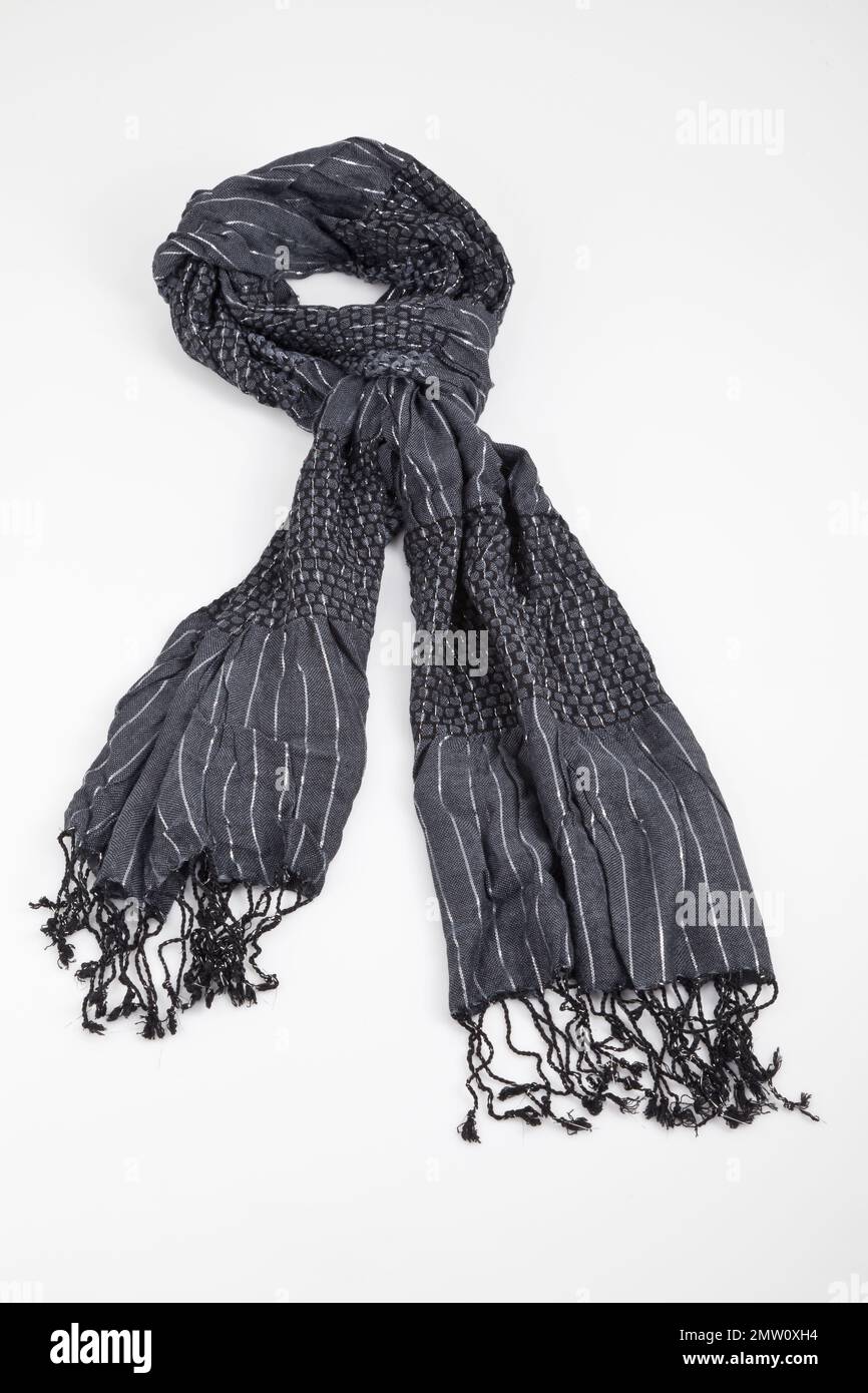 Grey Scarf Woven With Fringes On White Background. Stock Photo