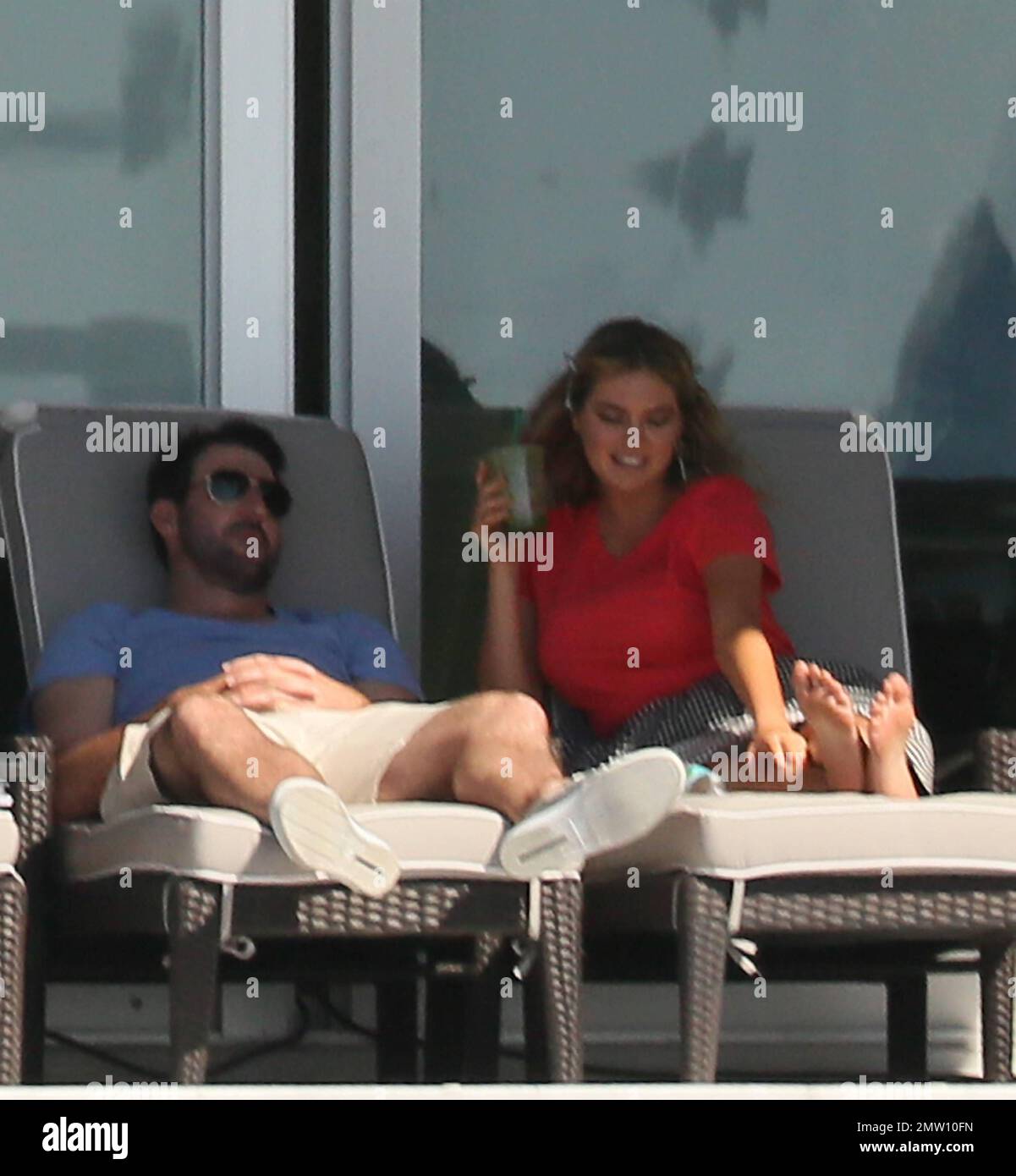 Model Kate Upton and her boyfriend Justin Verlander put on a cute display  of their romance during a photo shoot today in South Beach. Upton spent  time in between scenes with Verlander