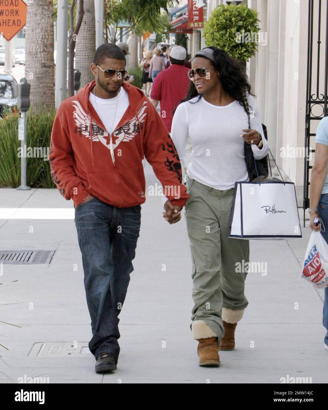 Exclusive!! Usher and his new fiancŽe, Tameka Foster, enjoy a romantic