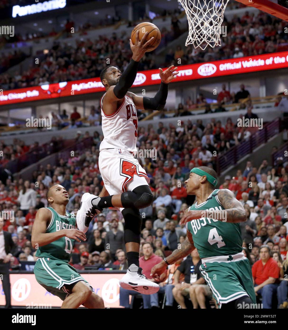 Chicago Bulls' Dwyane Wade (3) shoots between Boston Celtics' Avery ...