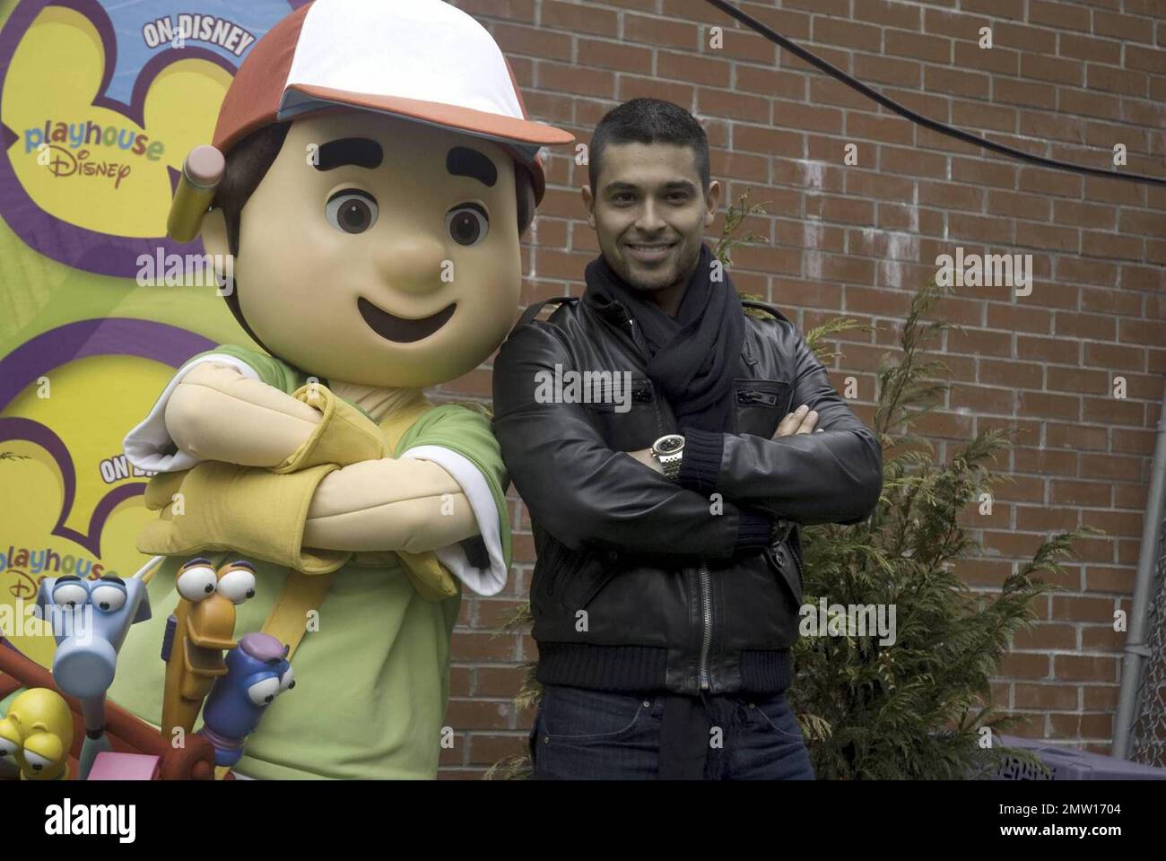 Actor Wilmer Valderrama, star of the Disney Channel's hit multicultural preschool series 'Handy Manny,' joins the Handy Manny character and kids from New York City's Earth School to plant a tree for Earth Day in the Generation X Garden on Manhattan's Lower East Side. In the hit series, Valderrama provides the voice for handyman Manny Garcia, a helpful, determined young man who, with the assistance of his eclectic set of talking tools, is the town's expert when it comes to repairing all that's not working, even friendships among neighbors. New York, NY. 4/15/09.    .  . Stock Photo
