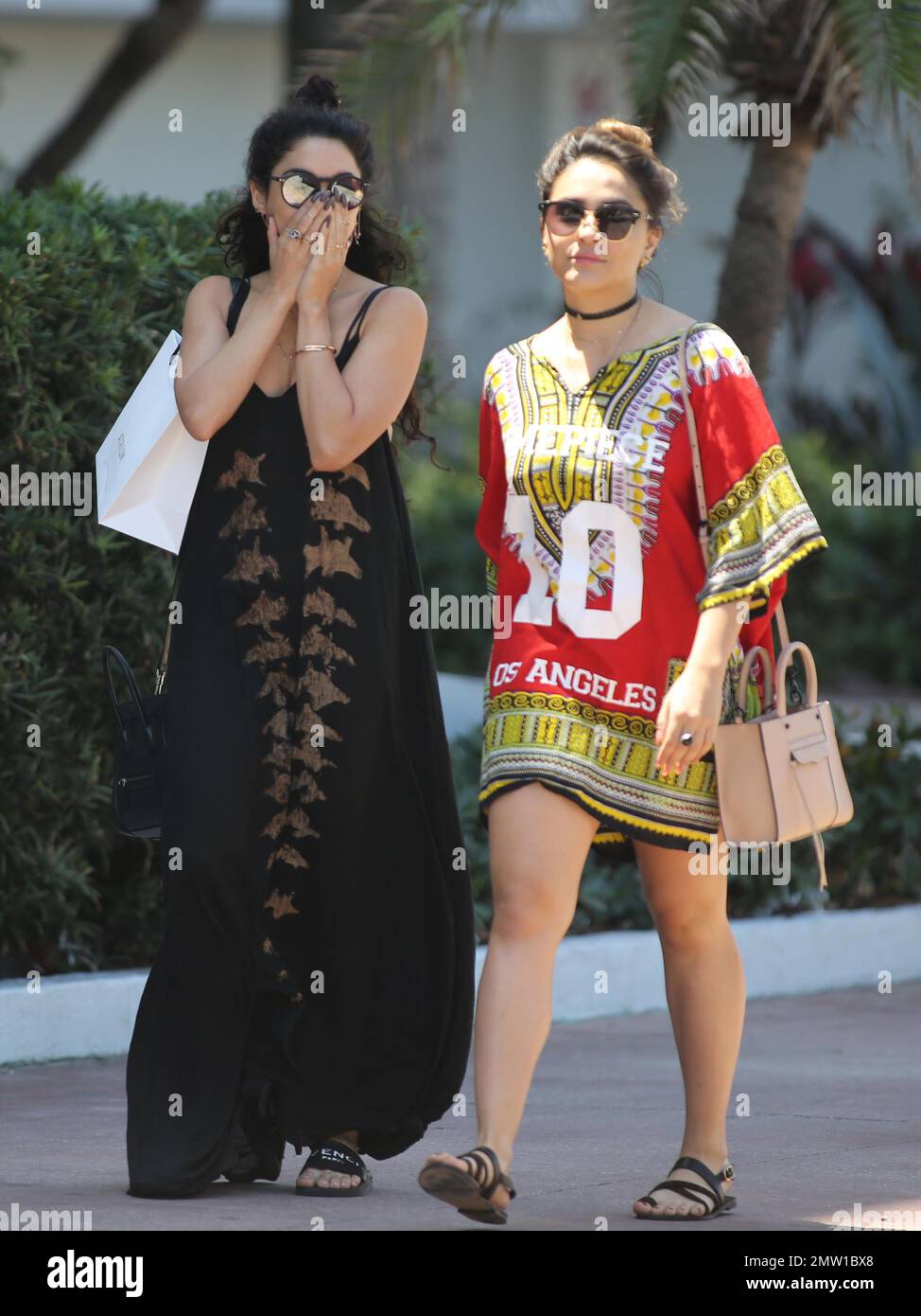 Vanessa Hudgens and her sister Stella spotted out shopping in the South Beach neighbourhood of Miami Beach, Florida. 9th April, 2016. Stock Photo