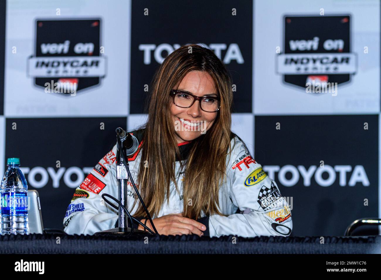 American actress Vanessa Marcil fields questions for the press after qualifying run. She finished 15th with her best lap time of 1:57.368 at the 2014 Toyota Celebrity/PRO Race practice and qualifying. Long Beach, CA. 11th April 2014. Stock Photo