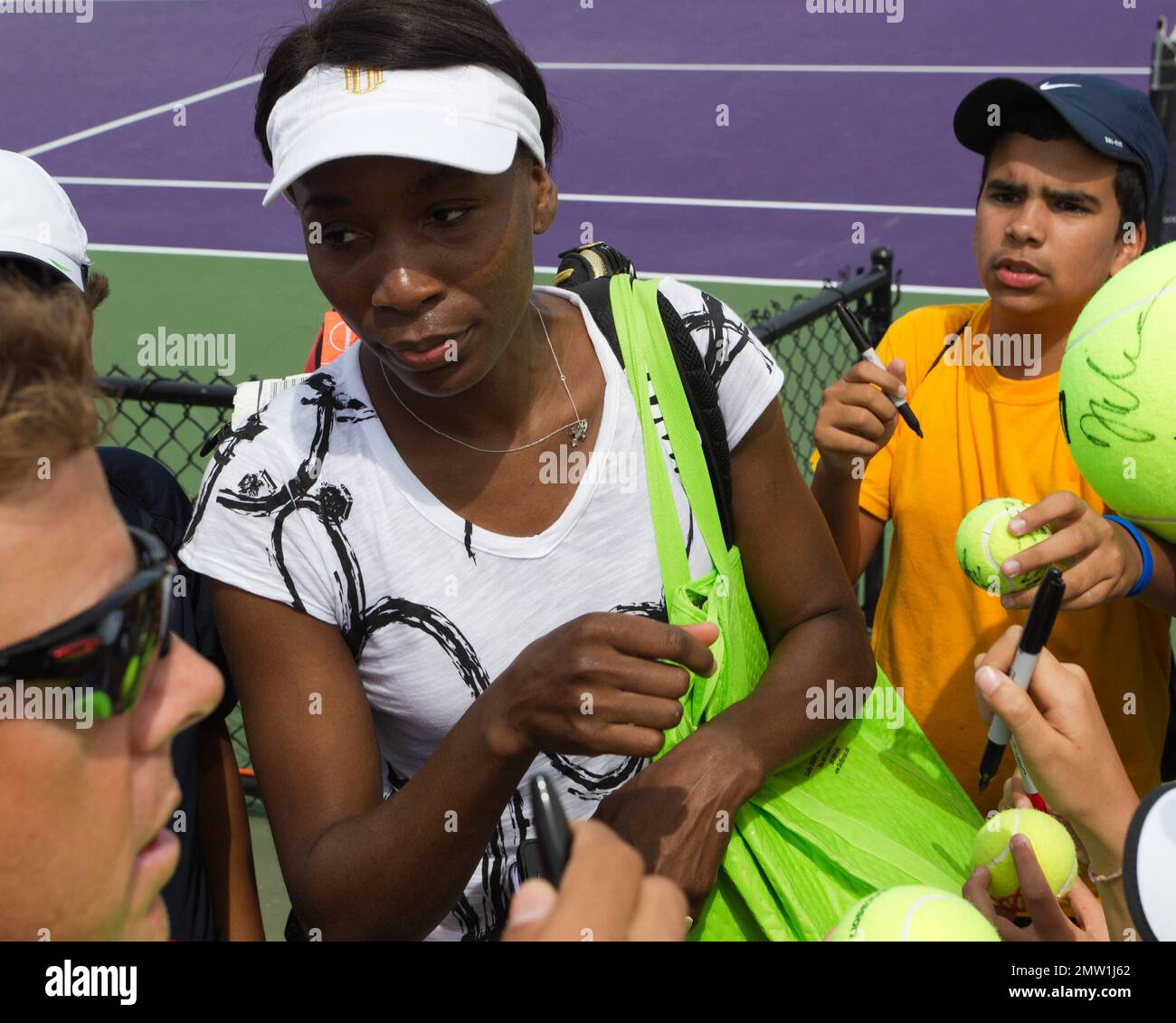 Venus Williams practices as her father looks on while warming up for the Sony Ericsson Open in Miami, FL. 20th March 2012. Stock Photo