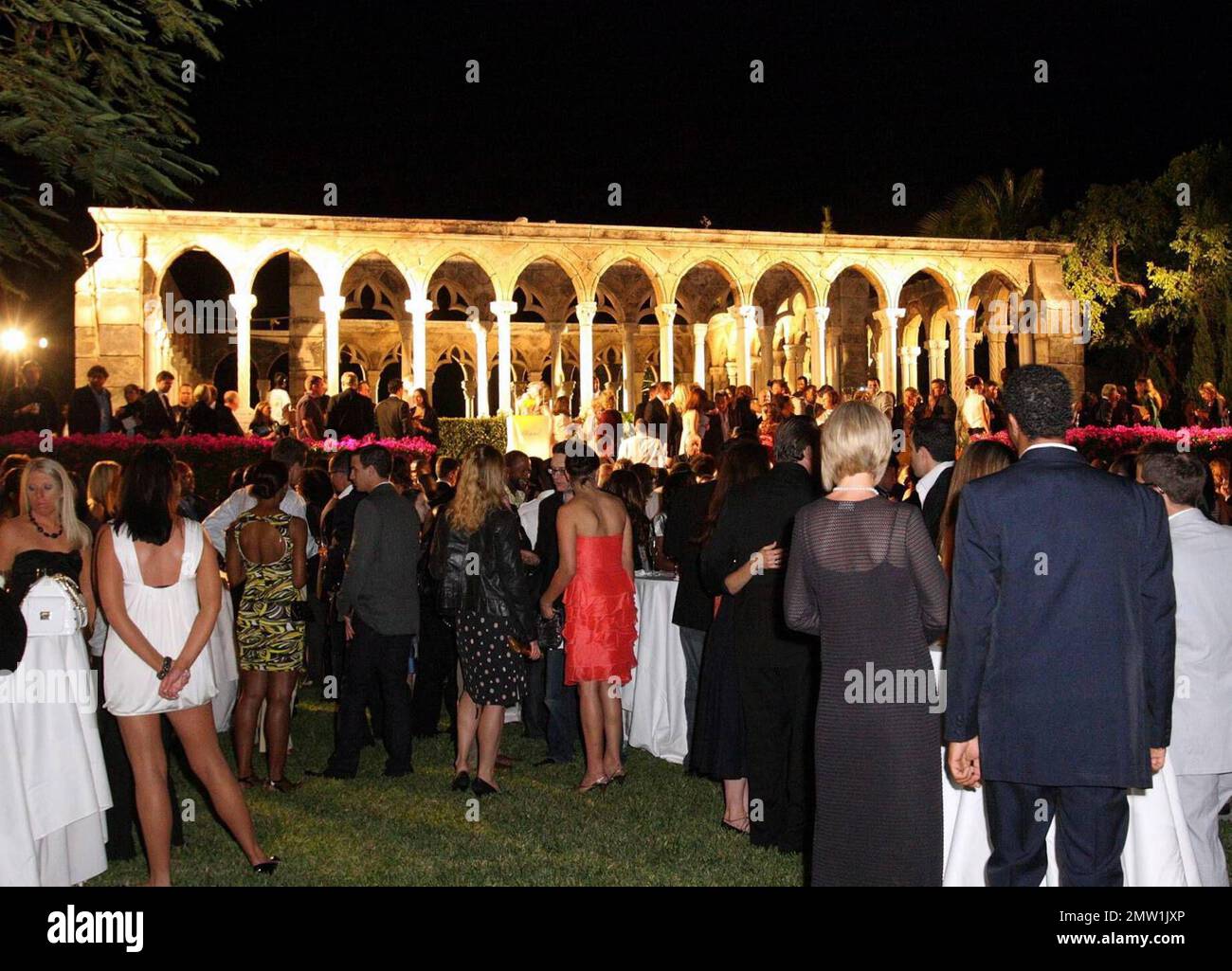 Models walk the runway during the Versace and Chopard Fashion Show at