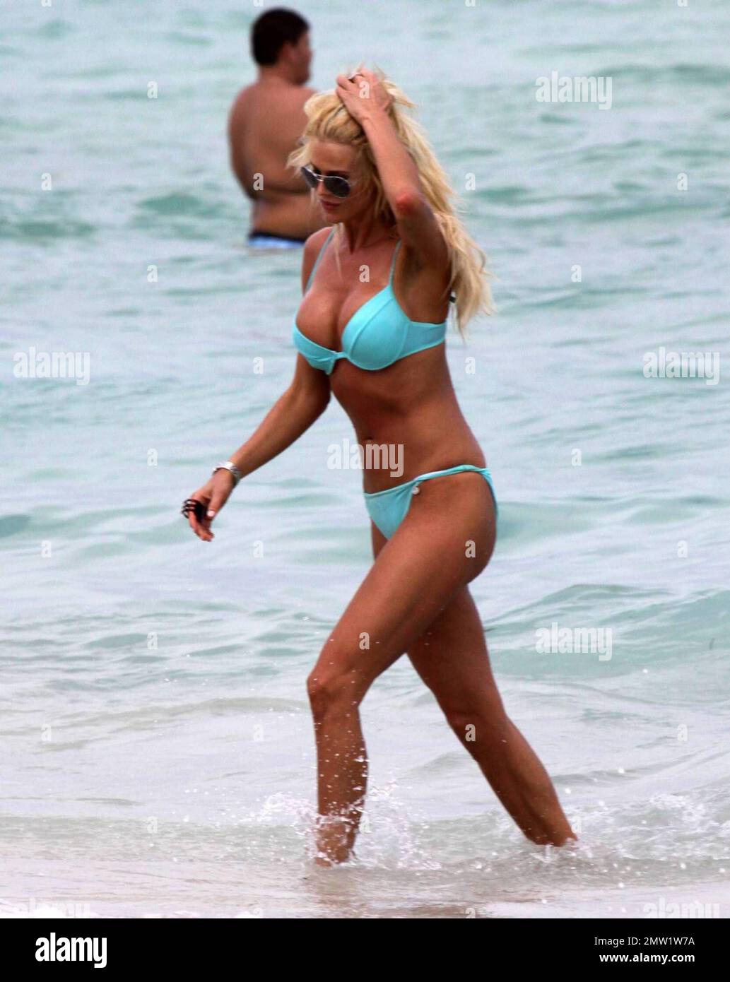 Exclusive!! Victoria Silvstedt looks like she is living up to the name of  her reality show, "My Perfect Life". The former Playboy Playmate flaunted  her perfect form on the beach in a