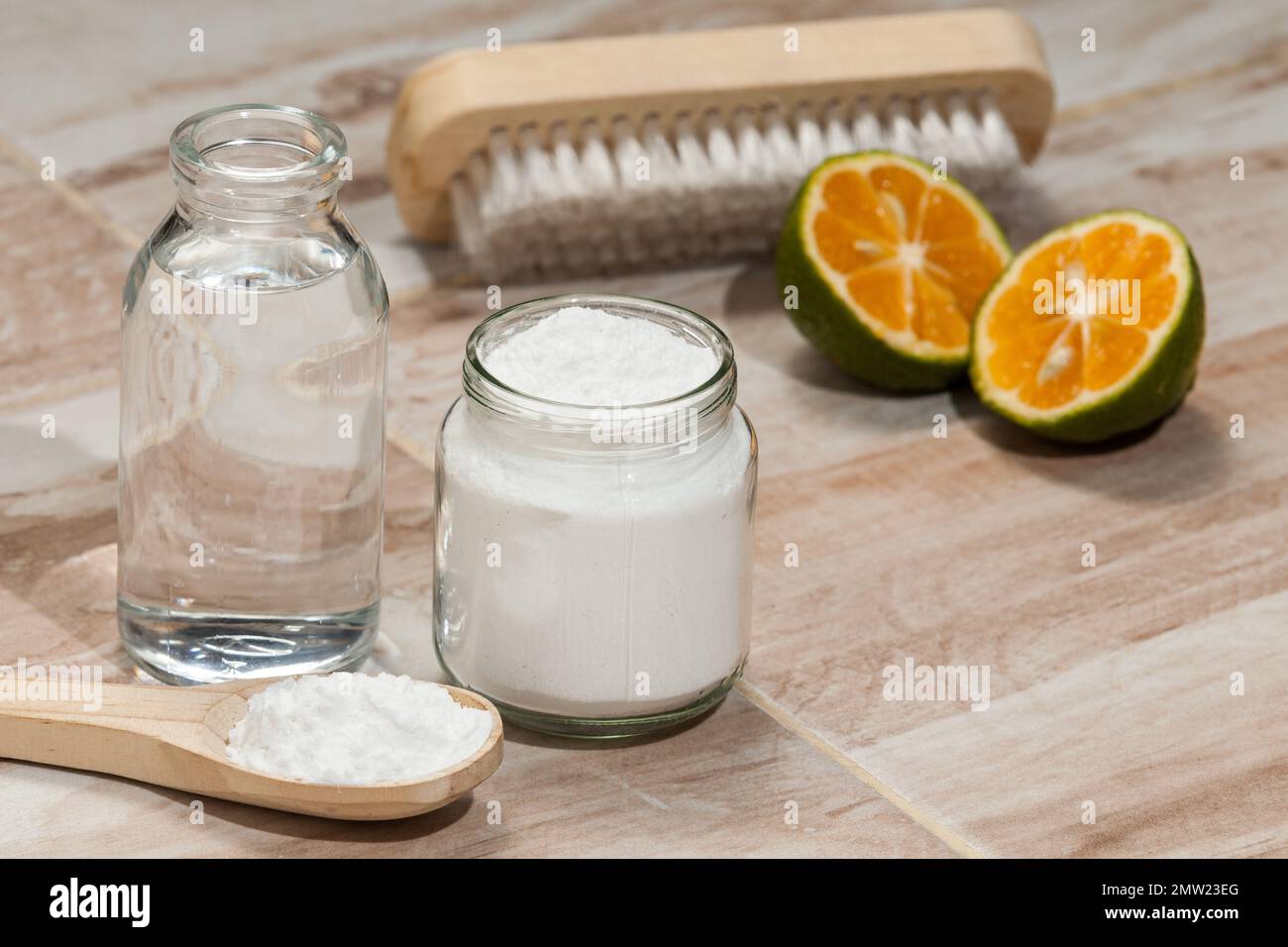 Baking soda - sodium bicarbonate, vinegar, and lemon; Cleaning agent. Stock Photo