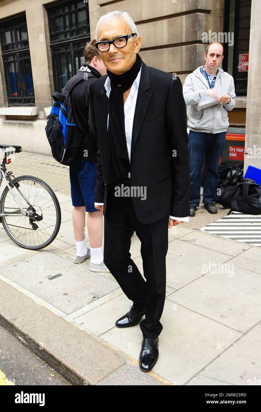 British-born Israeli hairdresser and businessman Vidal Sassoon arrives at  BBC Radio studios with his wife Ronnie to promote a new documentary about  his work and life Vidal Sassoon: The Movie. London