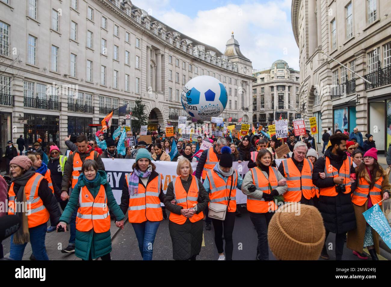 London, UK. 1st February 2023. Protesters in Regent Street. Thousands of teachers and supporters marched in central London as teachers across the country begin their strike over pay. The day has seen around half a million people staging walkouts around the UK, including teachers, university staff, public service workers and train drivers. Credit: Vuk Valcic/Alamy Live News. Stock Photo