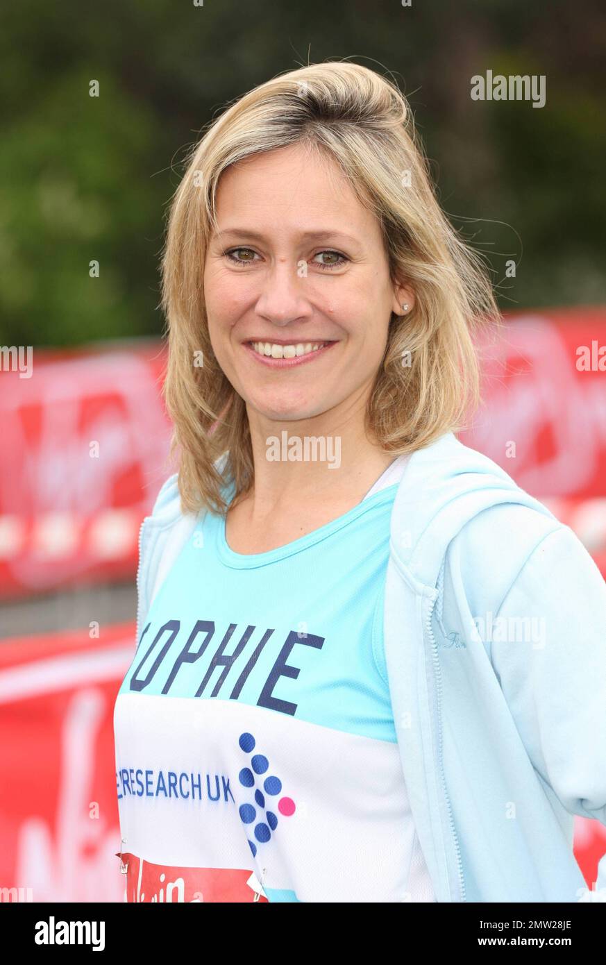 Sophie Rayworth poses for photographers at the celebrity start during