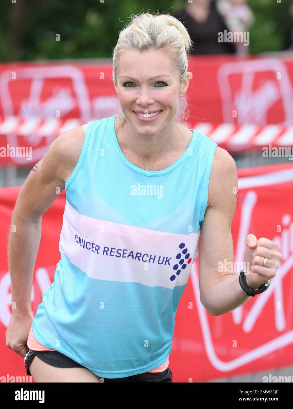Nell McAndrew poses for photographers at the celebrity start during the