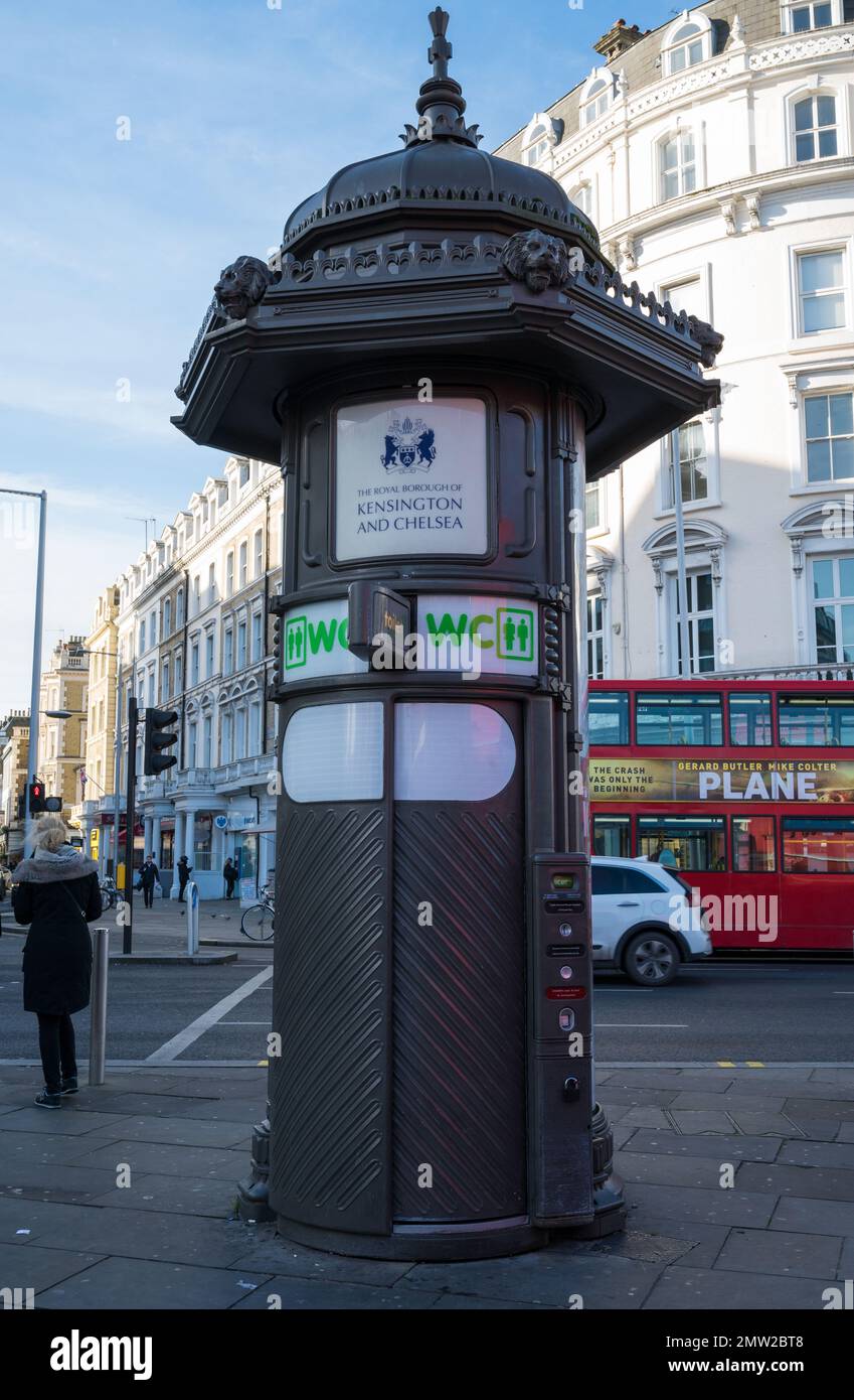 Elaborately styled coin operated public toilet kiosk on Old Brompton Road, South Kensington, London, England, UK Stock Photo