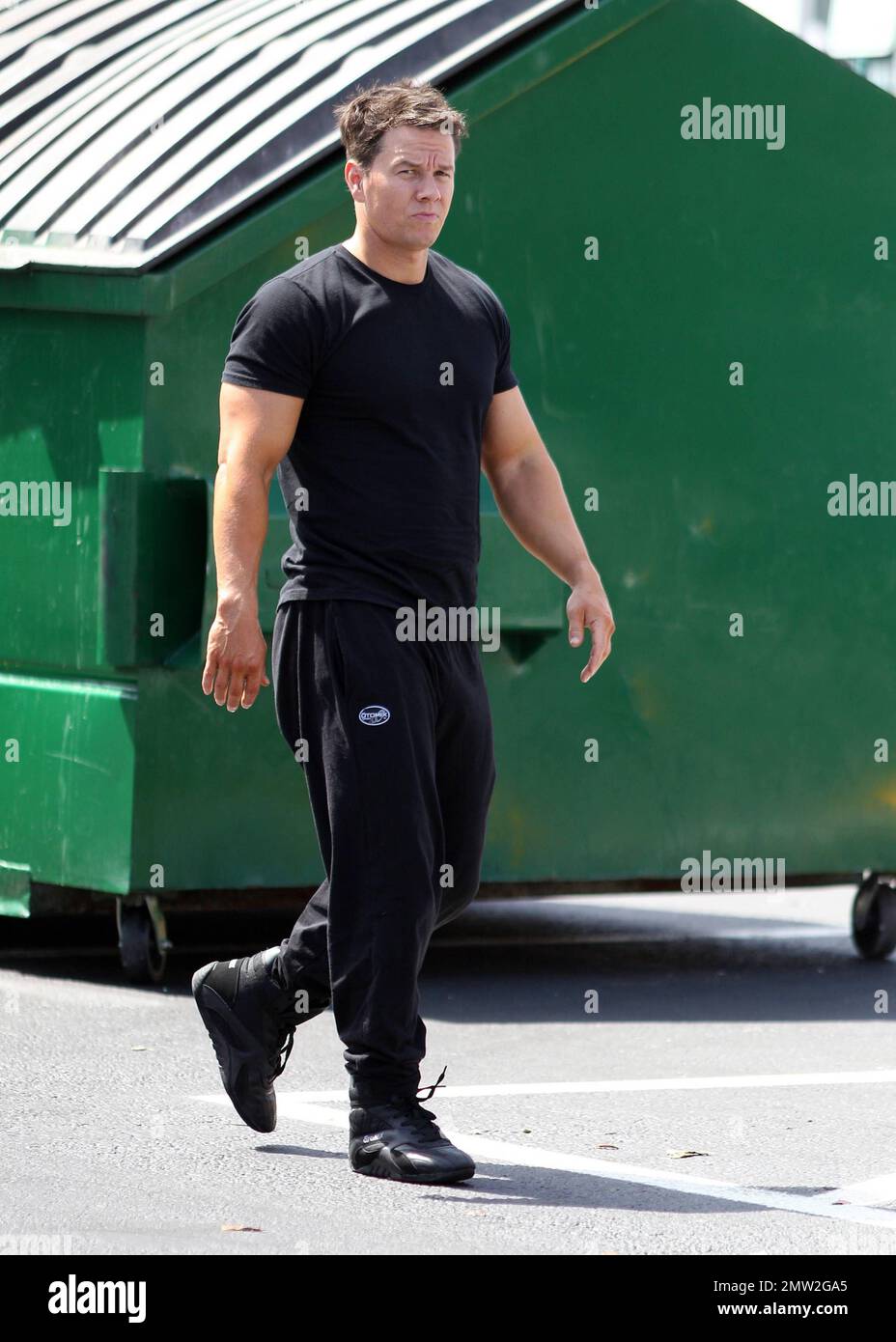 Mark Wahlberg films scenes on the set of his new movie 'Pain and Gain' on the streets of Miami, FL. 16th April 2012. Stock Photo