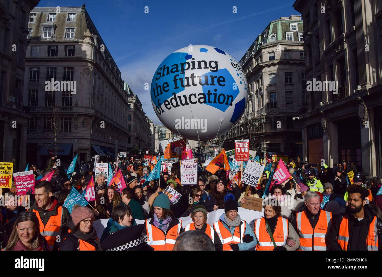 London, UK. 1st February 2023. Protesters in Regent Street. Thousands of teachers and supporters marched in central London as teachers across the country begin their strike over pay. The day has seen around half a million people staging walkouts around the UK, including teachers, university staff, public service workers and train drivers. Credit: Vuk Valcic/Alamy Live News. Stock Photo