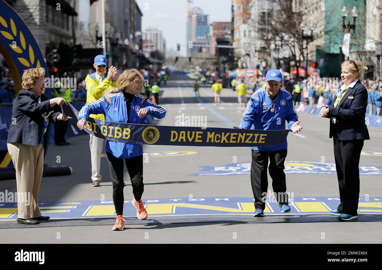 Grand Marshals Bobbi Gibb, left, of the United States, and Dave