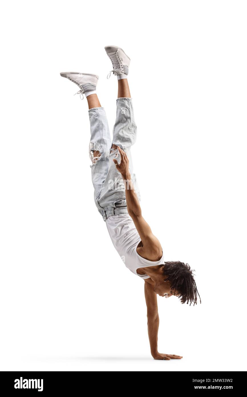 African american male dancer performing a handstand isolated on white background Stock Photo