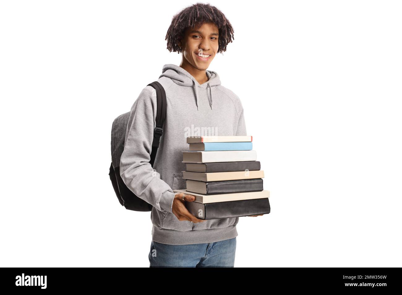 Smiling male african american student with a backpack holding a pile of ...
