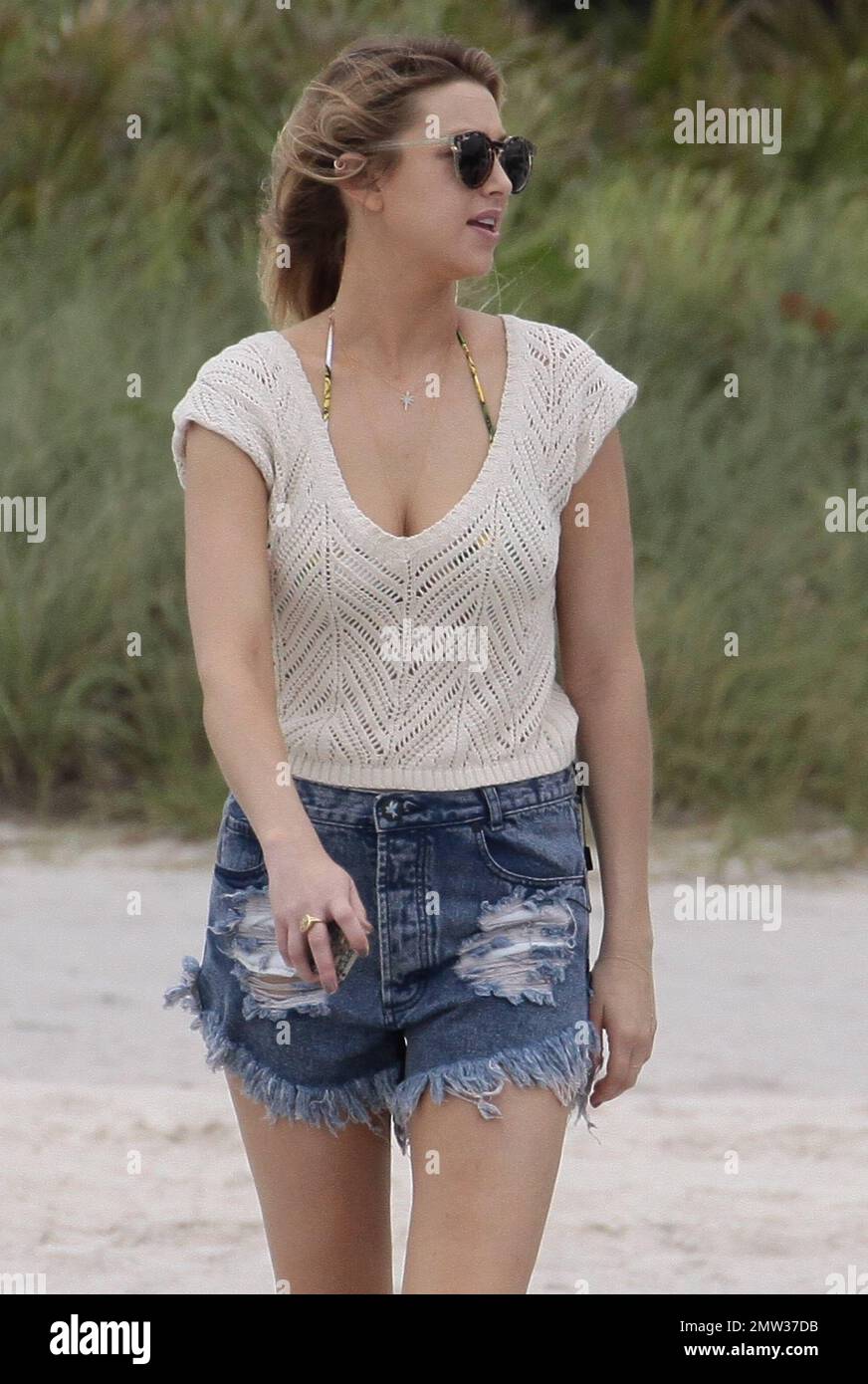 Whitney Port was spotted arriving at South Beach in a tan crochet top and  cut-off jean shorts. The 27 year old reality star was meeting up with  friends to spend the afternoon