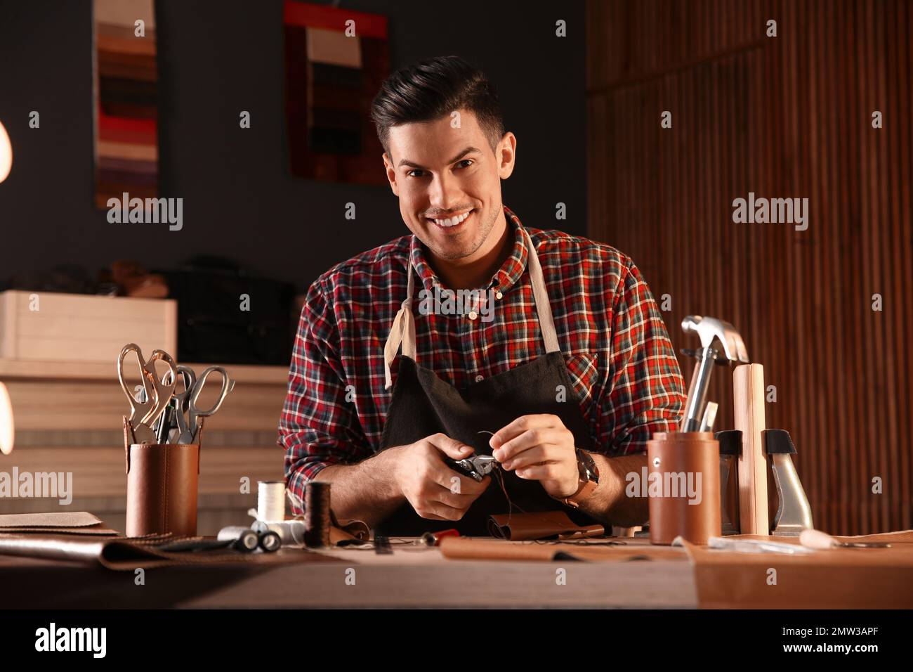 Needle and thread in leather hi-res stock photography and images - Alamy