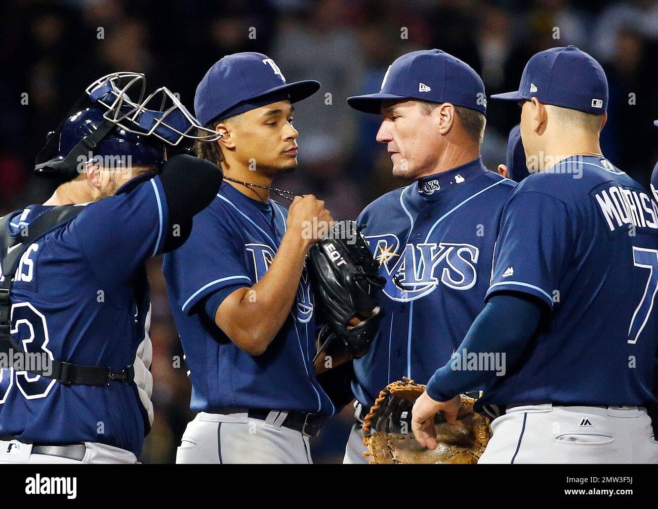 Tampa Bay Rays pitching coach Jim Hickey, center right, talks with