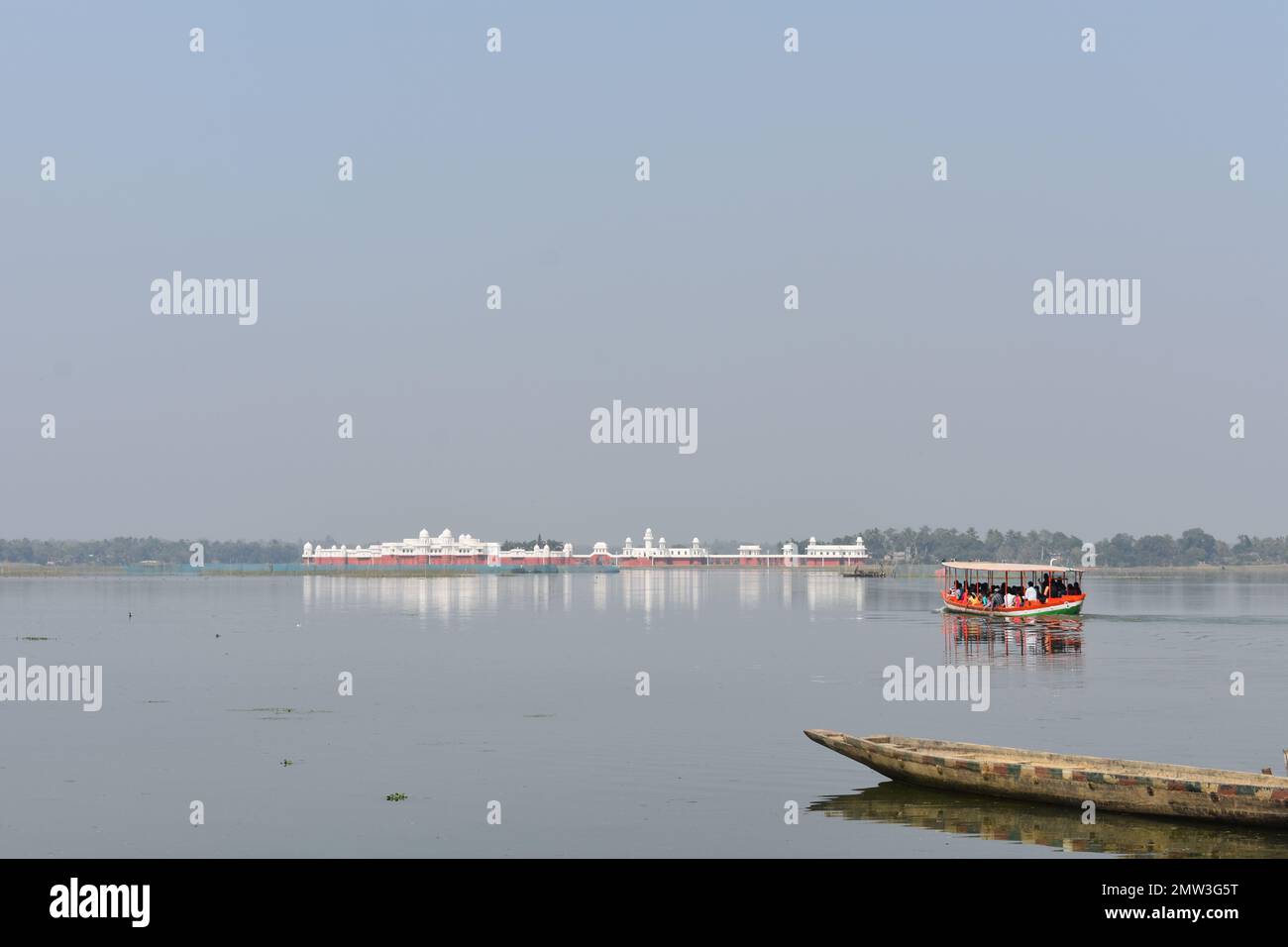 A view of Nirmahal and boats in Rudrasagar lake in Tripura , India . Stock Photo