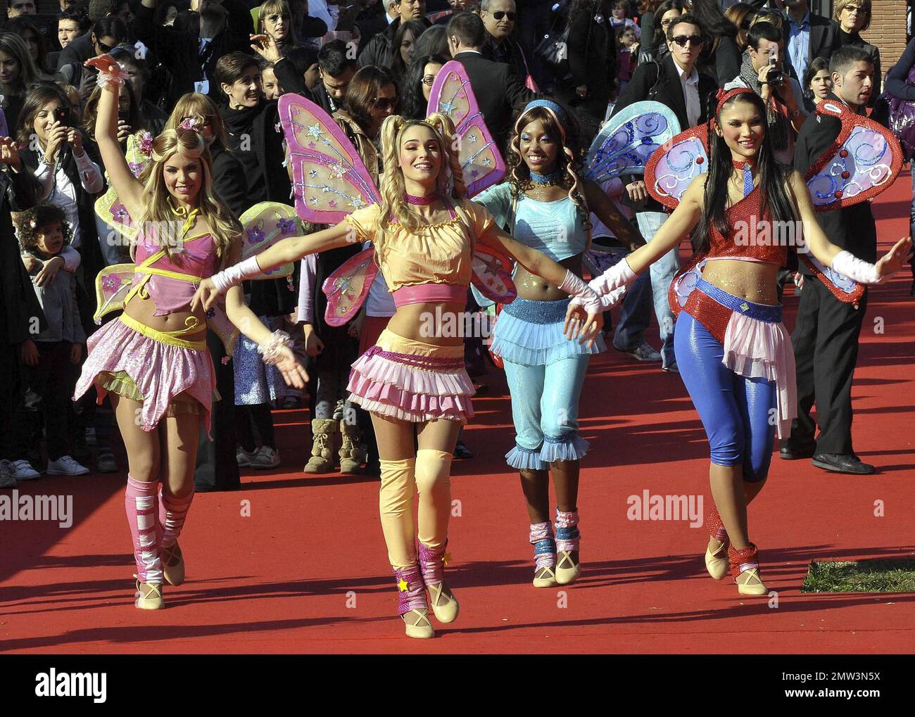 Cast walk the red carpet at the Winx Club 3D premiere at the