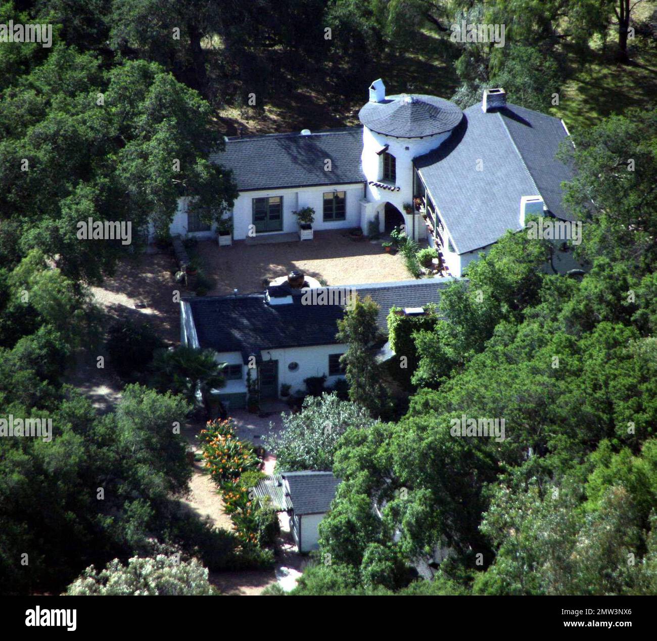 Exclusive!! This is reportedly Reese Witherspoon's new romantic retreat with Jake Gylenhaal. The lovenest is situated in a private community in the heart of the Ojai valley. Originally built by famed architect, Wallace Neff, the home has been  profesionally re-designed by Kathryn Ireland. The home has four bedrooms, three baths and a new master suite. It is nestled amongst trees and sits on more than six acres in an equestrian area. It was listed at $6,950,000. Ojai, Ca. 3/31/08. Stock Photo