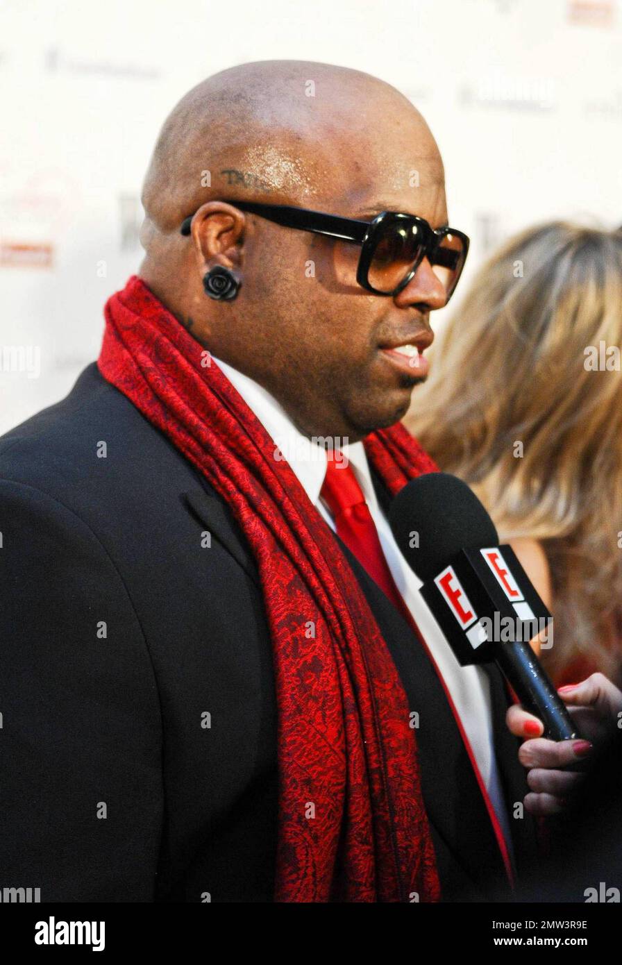 Cee Lo Green wears black flower-shaped earrings at Woman's Day 8th Annual  Red Dress Awards held at Jazz at Lincoln Center. New York, NY. 02/08/11  Stock Photo - Alamy