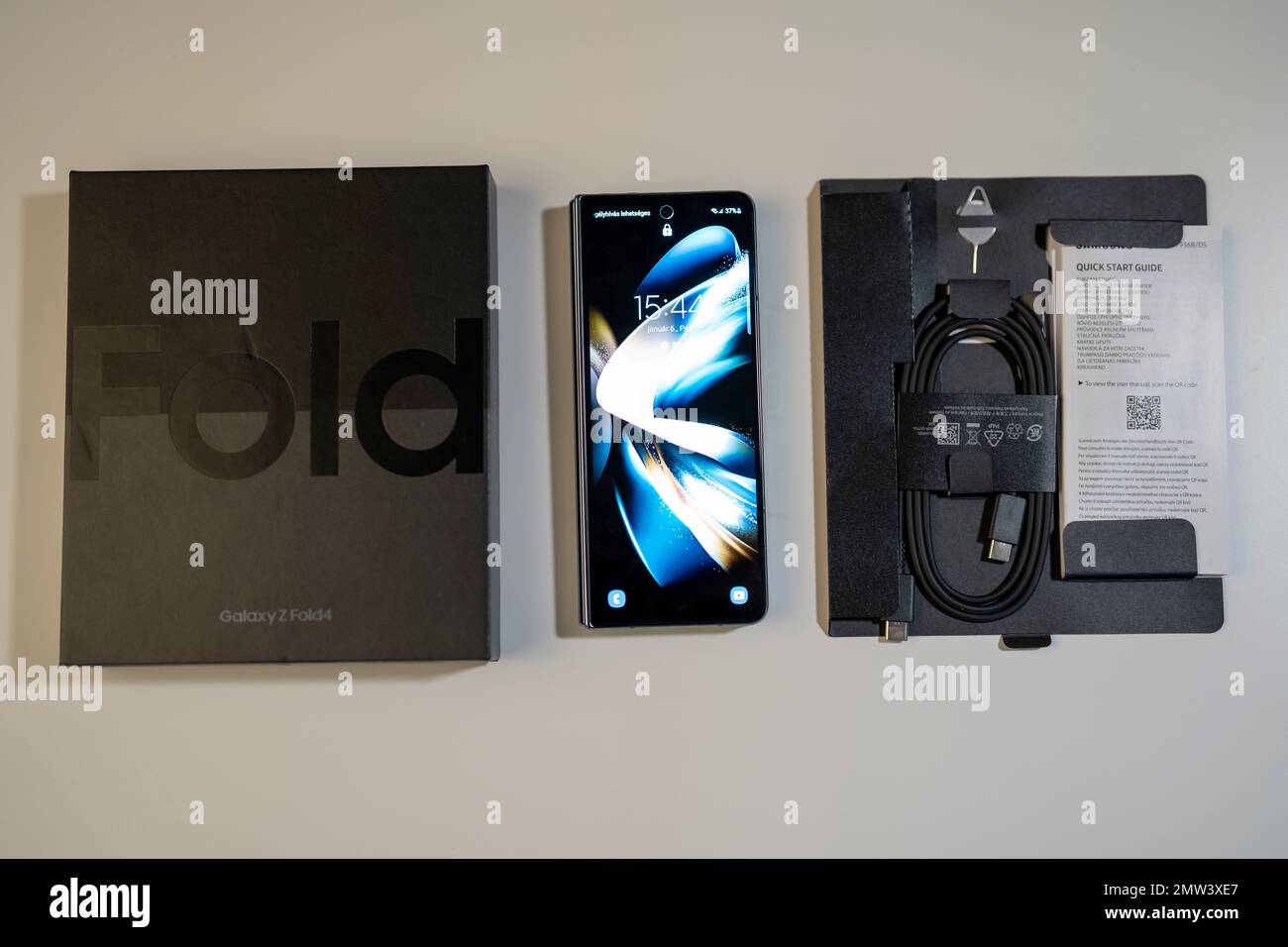 Samsung Galaxy Z Fold 4 in grey-green color. The device is in the closed position. Stock Photo