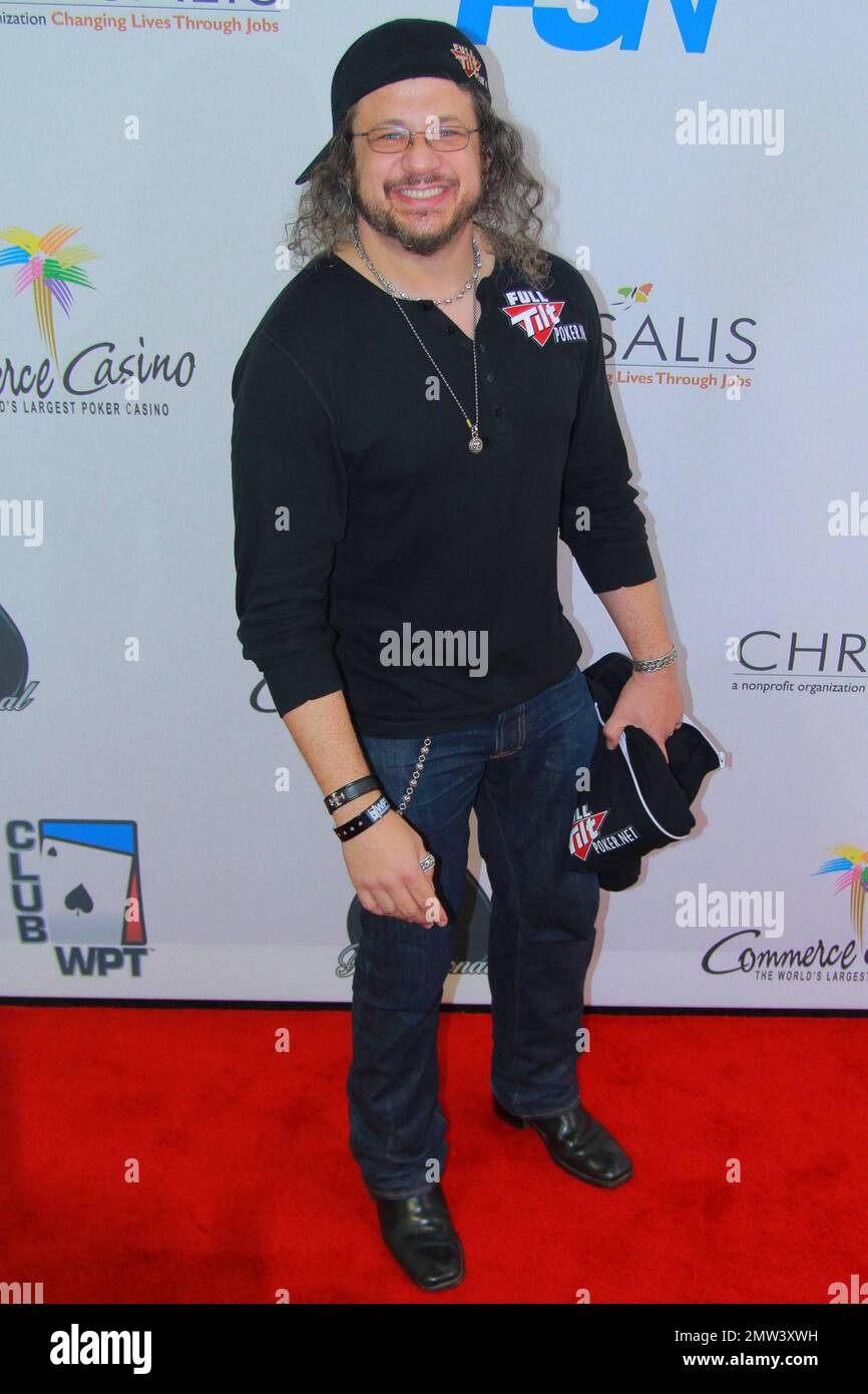 Joseph (Joe) D. Reitman arrives on the red carpet at the 8th Annual World Poker Tour Invitational Texas Hold 'Em poker tournament for the Chrysalis Charity, a non-profit organization dedicated to helping homeless and economically disadvantaged individuals become self-sufficient through employment opportunities, at the Commerce Casino, in Los Angeles, California, 02/20/10. Stock Photo