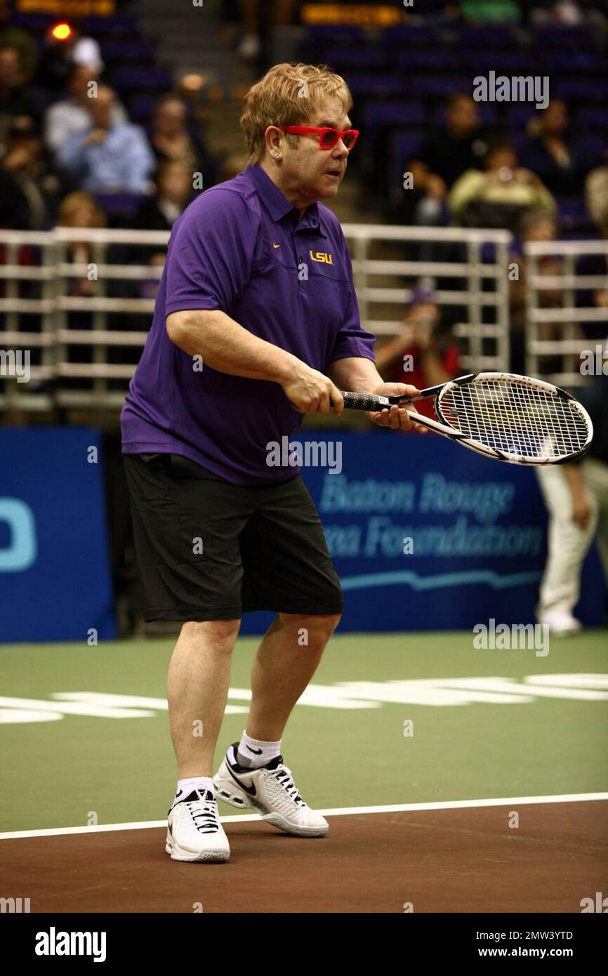 Elton John competes on the court at the Advanta World TeamTennis (WTT)  Smash Hits charity tennis event. The annual tennis event was held at the  Peter Maravich Assembly Center on the campus