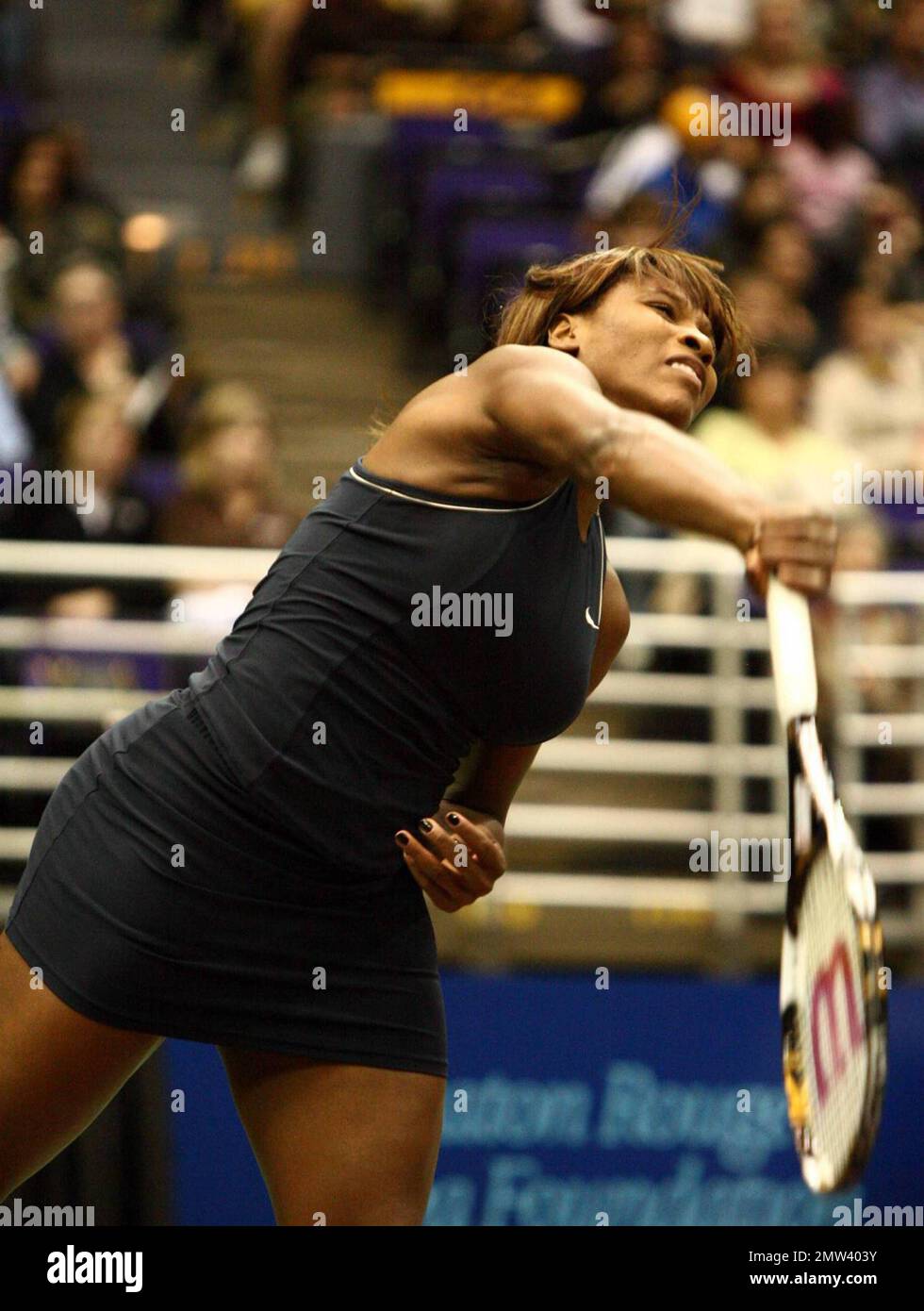 Serena Williams competes on the court at the Advanta World TeamTennis (WTT) Smash Hits charity tennis event with Anna Kournikova. The annual tennis event was held at the Peter Maravich Assembly Center on the campus of Louisiana State University. Baton Rouge, LA 12/8/09. Stock Photo