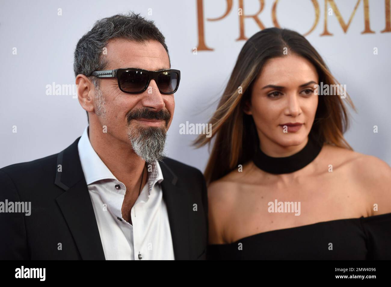 Serj Tankian, lett, and Angela Madatyan arrive at the U.S. premiere of